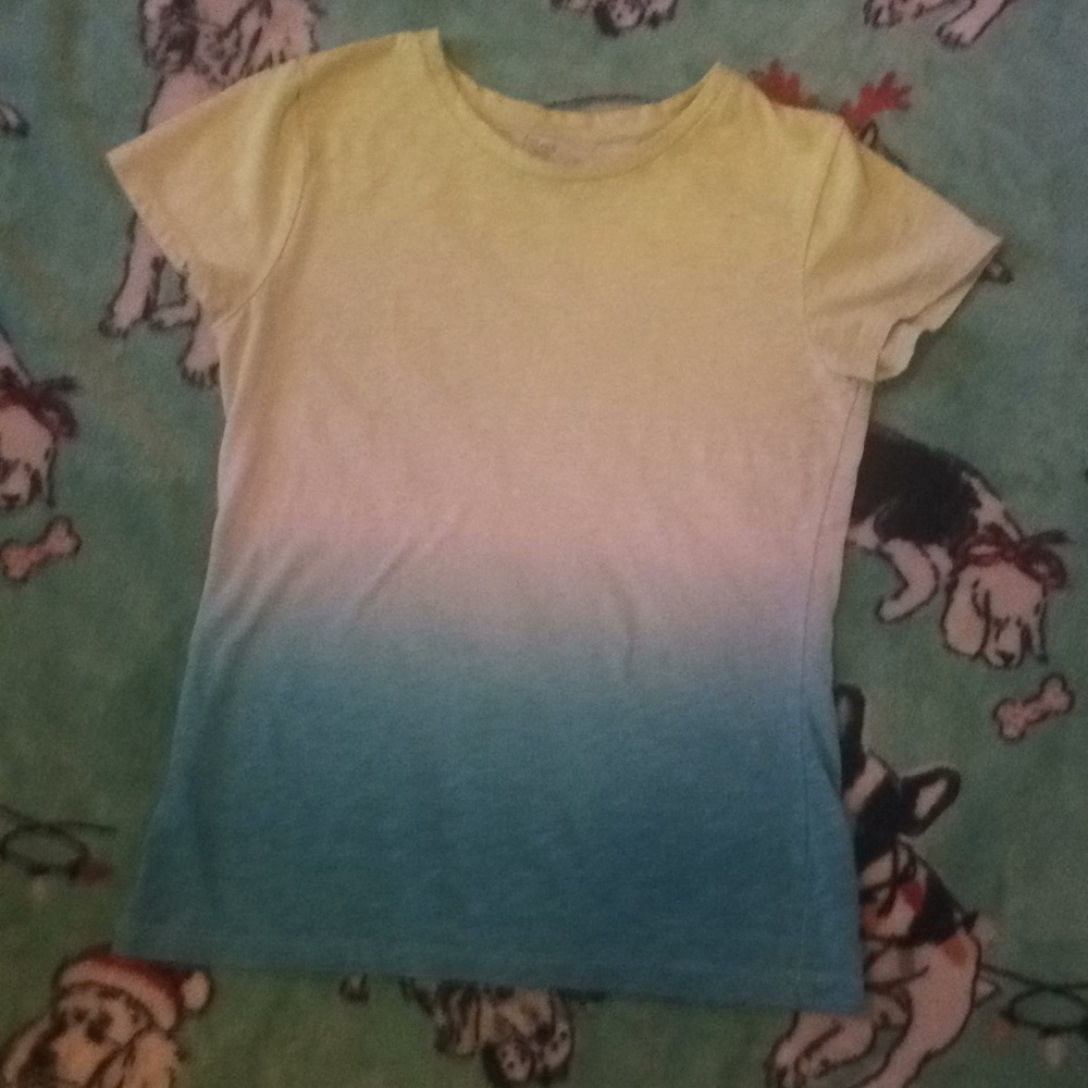 A yellow,white,and blue shirt.